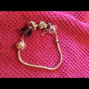 Sterling silver bracelet with beads and accents.